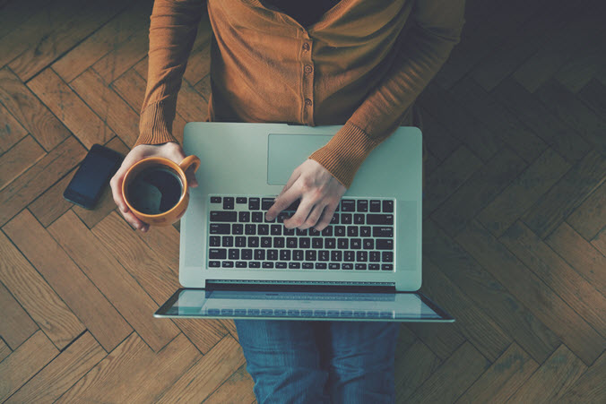 guy on laptop - shutterstock_251616610